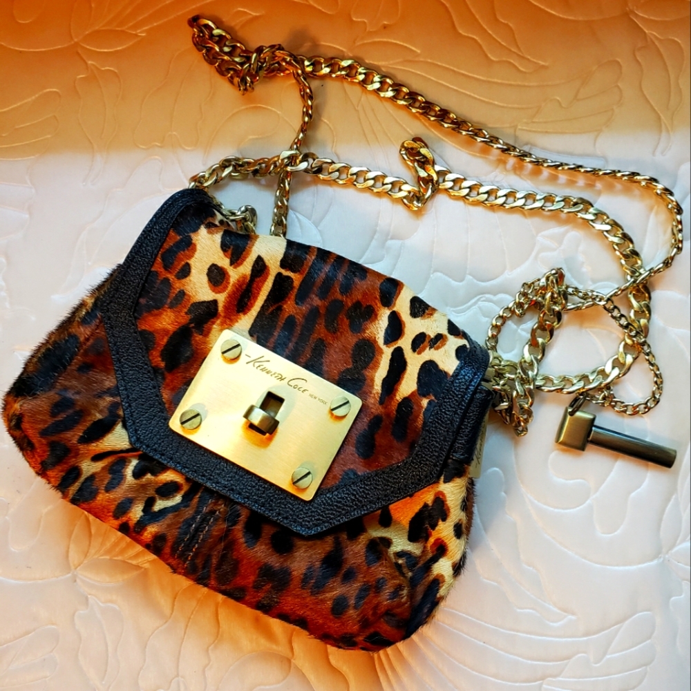 Small cheetah print clutch